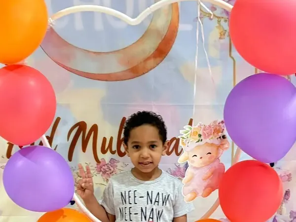 A child at a Nurtaqwa Kindergarten celebration.